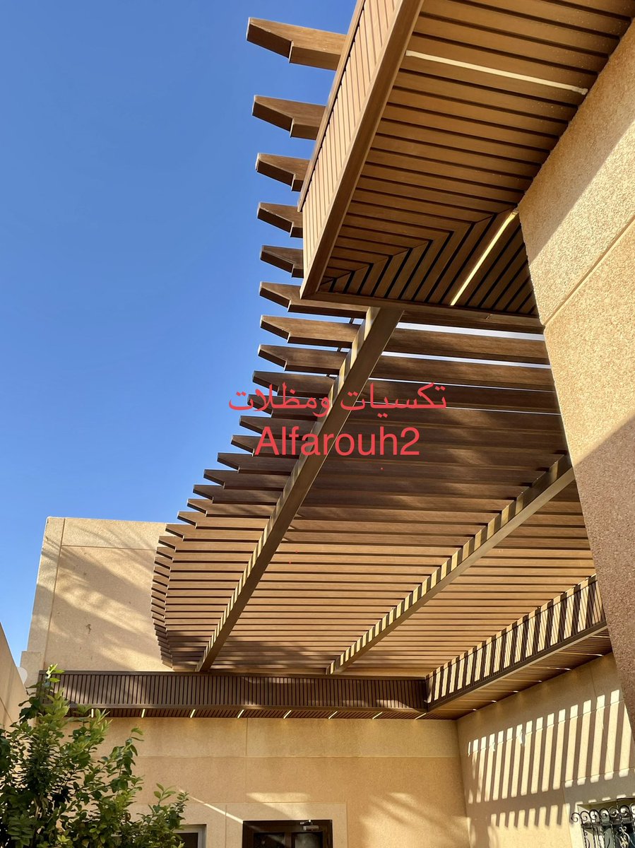 تنفيذ تكسيات مظلع مع مظلة برجولا من مادة WPC المستورد والملائم للعوامل الطبيعية