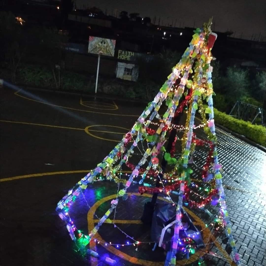 MtumishiSimba's tweet photo. The second crown we are laying at the foot of the cross is our Christmas tree made from Plastic bottles and made by children who have 'no material gifts' to present to the king of kings, but their gifts and talents.

John 3:16

#jesusisthereasonfortheseason #Christmas #CBCK https://t.co/jLMJLeaSzZ