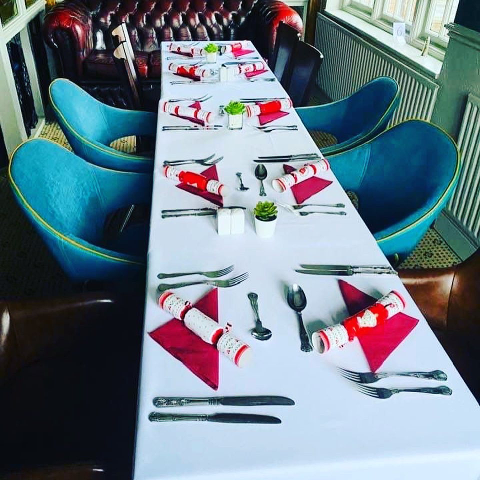 Half_wayHouse's tweet photo. The tables are all set ready for Christmas dinner today - we look forward to welcoming you all #merrychristmas #thehalfway #christmasdinner #brentwood #essex https://t.co/F2ijbjn2UR