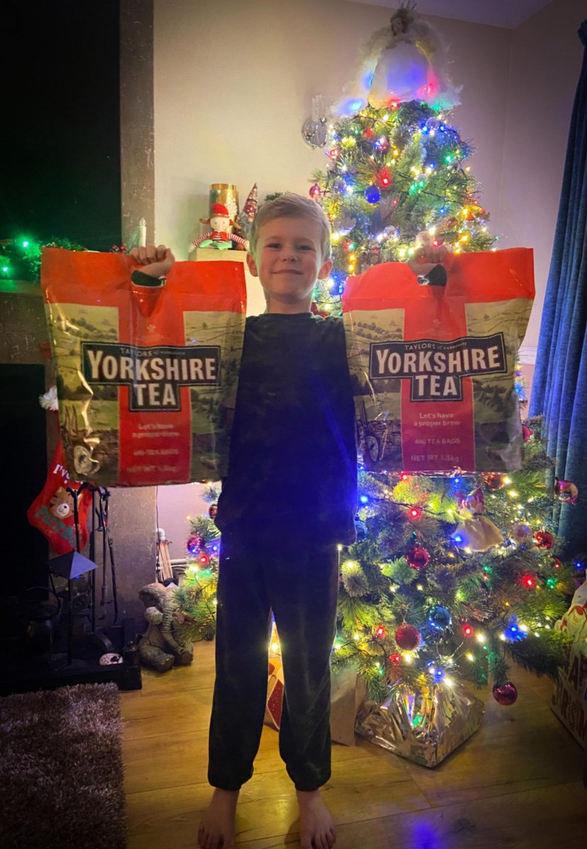 YorkshireTea's tweet image. Happy Christmas! We hope you got lots of Yorkshire Tea from Santa, like young Reuben here. 

If you got something rubbish, like a TV, phone, games console, perfume, jewellery, that sort of thing, then you have our sympathies. You'll just have to try and be less naughty in 2022.
