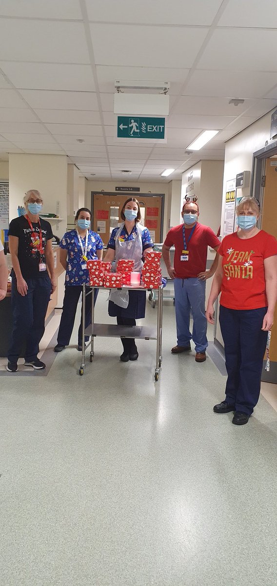 AklakC's tweet photo. Merry Christmas from Ward 404 - our COVID ward. Dishing out the presents to all our patients 🥳. Hoping you are all having a wonderful day. @avforman @RachelJacob9 @uhdbRespiratory @UHDBTrust #Christmas https://t.co/fWErwTAc3H
