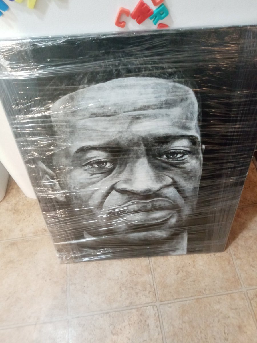 Phatz1966's tweet photo. Something amazing happened last night I won this portrait of George Floyd, both he and my son was both murdered by the police and out of all the ppl in the room and there were over 30 ppl my number was called https://t.co/hvQrr10Efq