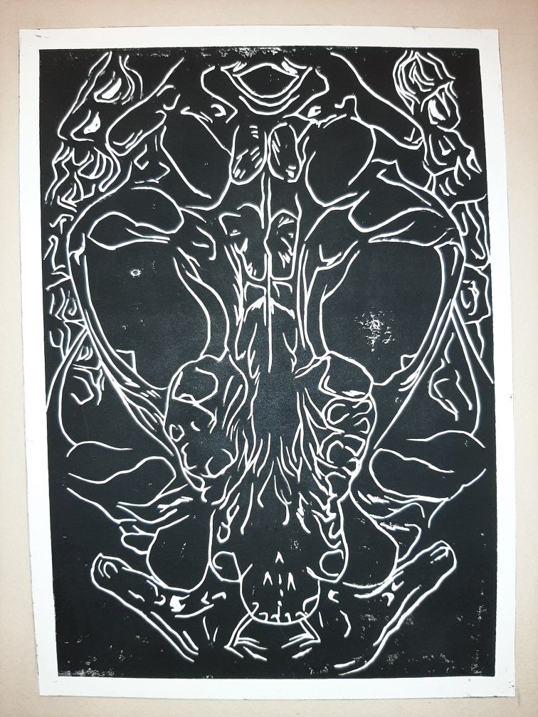 Under my christmas tree I found a lino print of the underside of the skull of a raccoon.