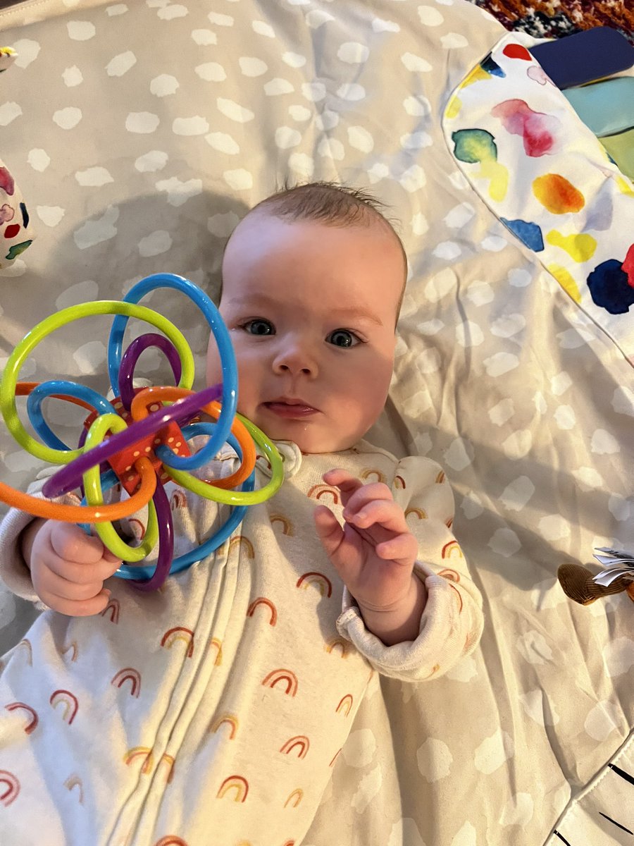 Bella says Merry Christmas while she examines the strange tesseract she got from her big sister.