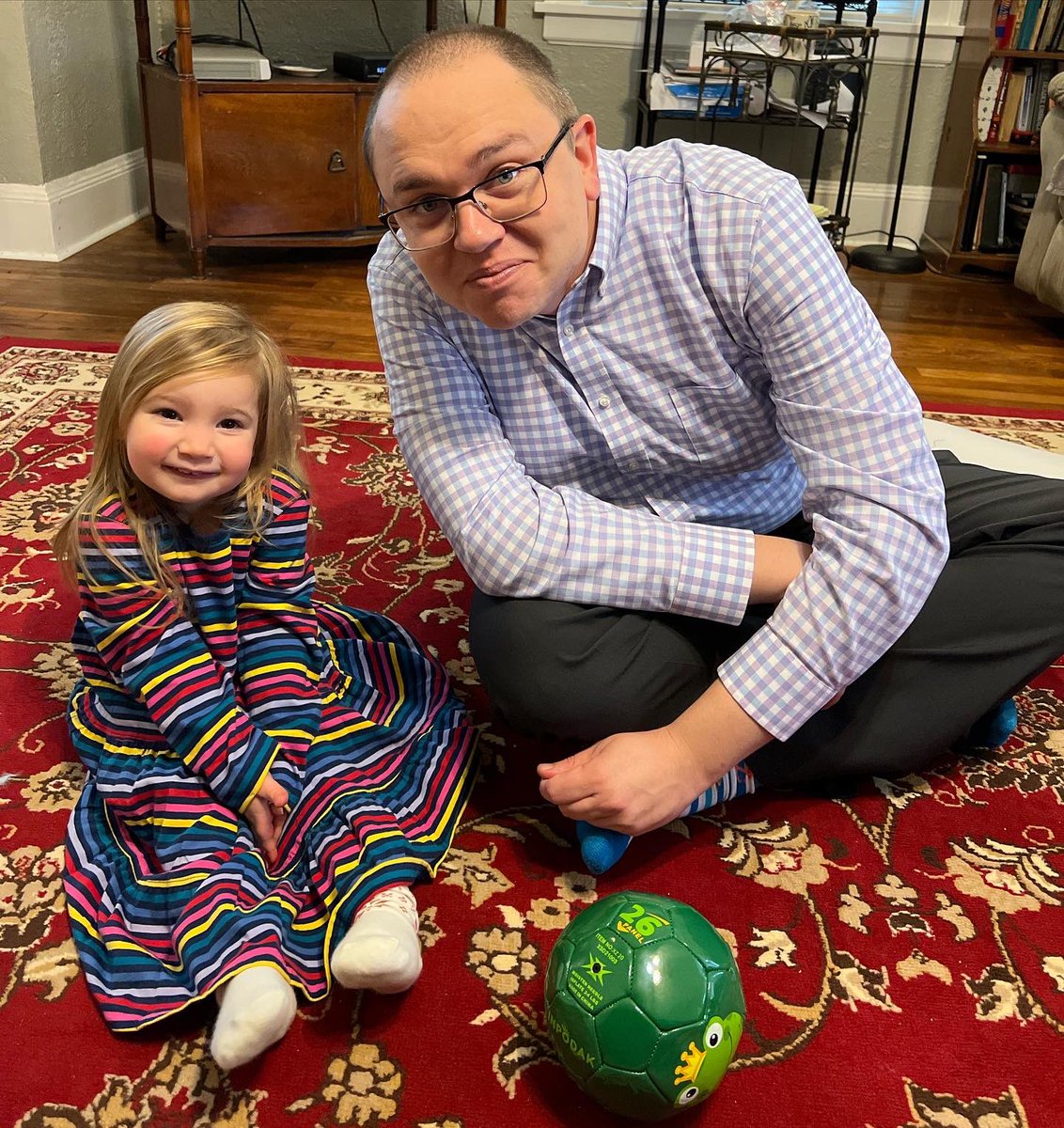 MilesMcQuiggan's tweet photo. Cat got her first ⚽️ for Christmas. Charlotte’s just here so she doesn’t get fined. #UncleMiles https://t.co/MQXxlob5Fd
