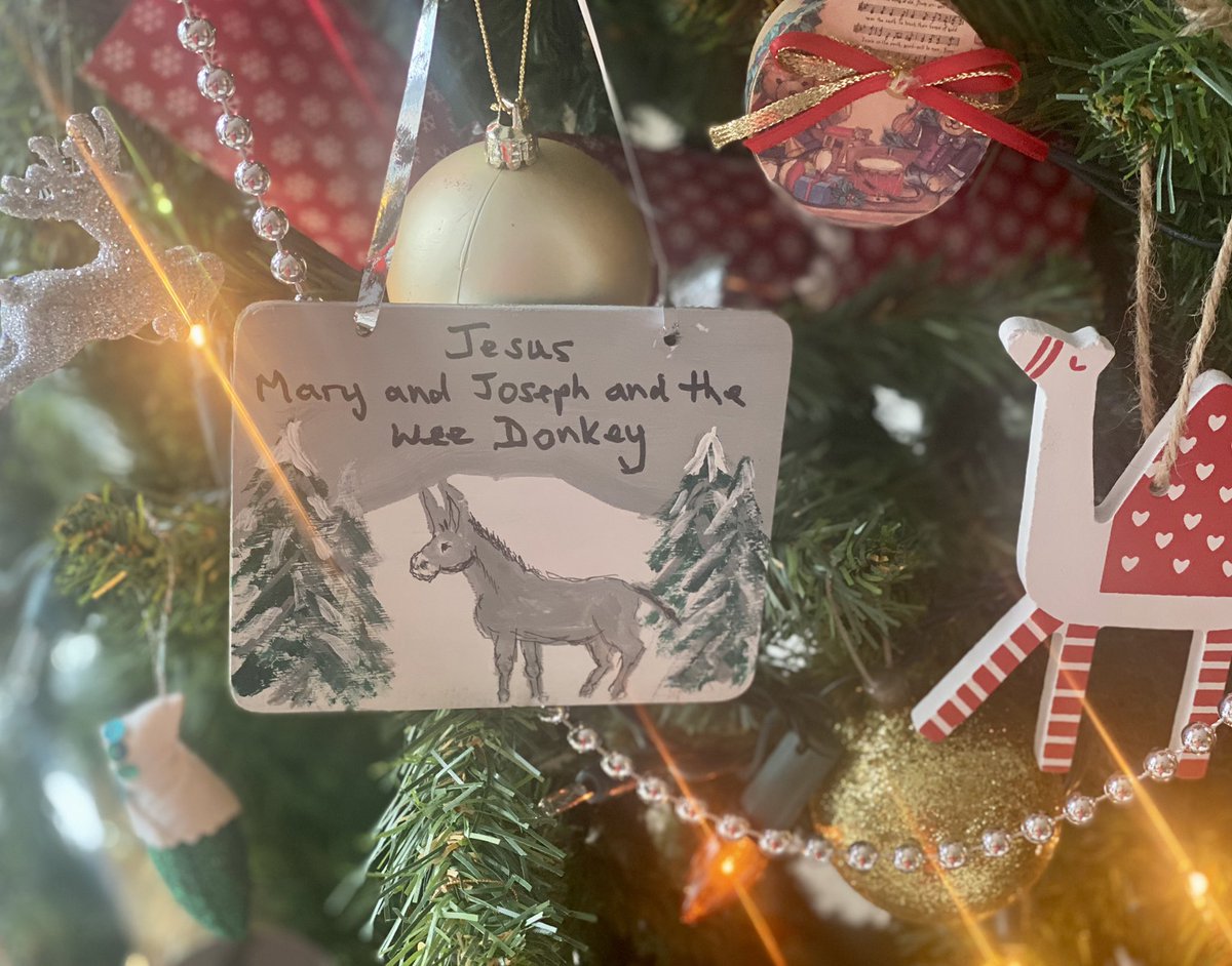 Jesus, Mary and Joseph and the Wee Donkey, Father Christmas (the mother) nailed the stocking gifts..