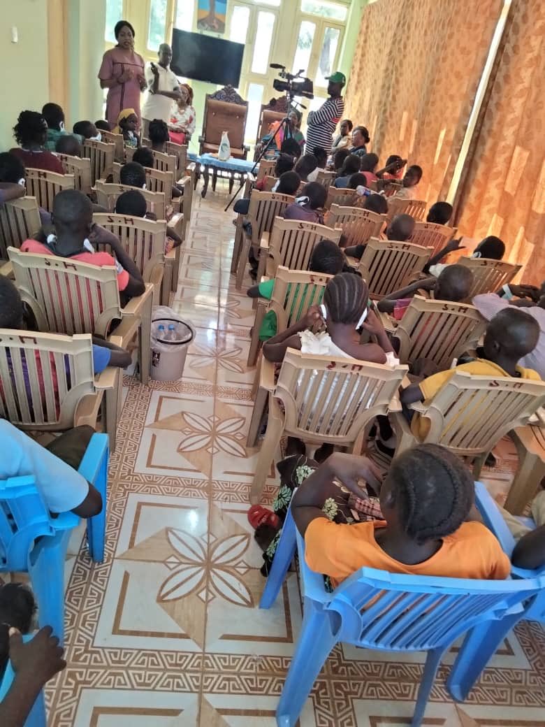 sarahrial's tweet photo. On Christmas Eve, 57 orphans visited the State House upon invitation from my office. Happy to host them.  They toured the house, we shared a meal together, and gave them a few gifts of clothes, shoes, and soccer balls. These are my children and our future. https://t.co/7IB5Y1cHBl