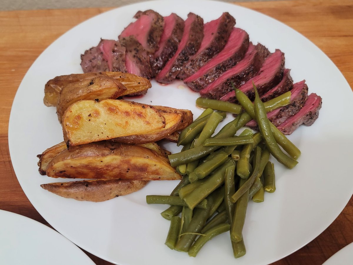 will18769's tweet photo. @ReneePaquette A little sous vide medium rare filet mignon over here with roasted potato wedges https://t.co/rcFOP2uBO1