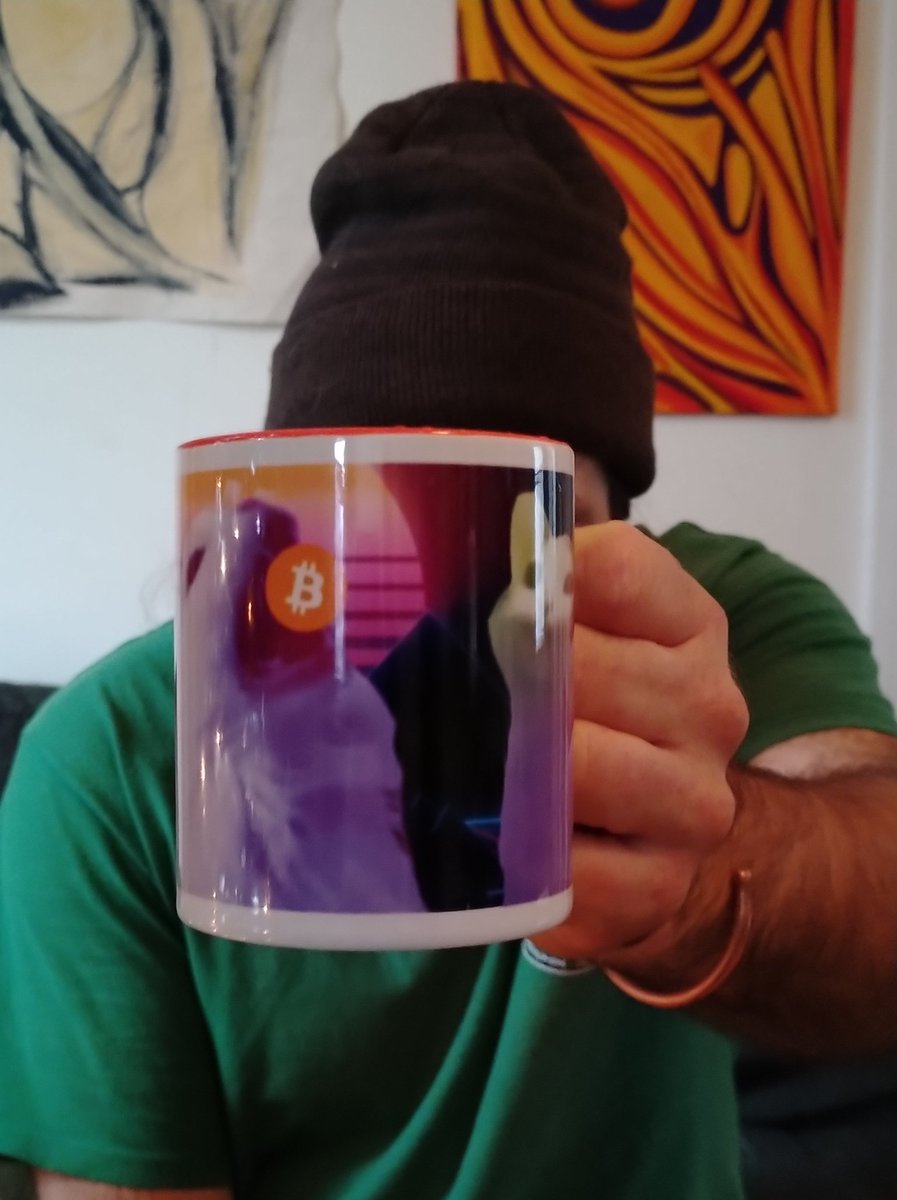 artbyizzybg's tweet photo. Got my guy a #Bitcoin cat mug for #Christmas and his reaction was priceless 🤩 thanks @MemeFactoryTM for creating this gem of a gift #popcat #bitcoincat #orange #lasereyes #HappyHolidays #bitcoinorbust https://t.co/0izMXlHjYu