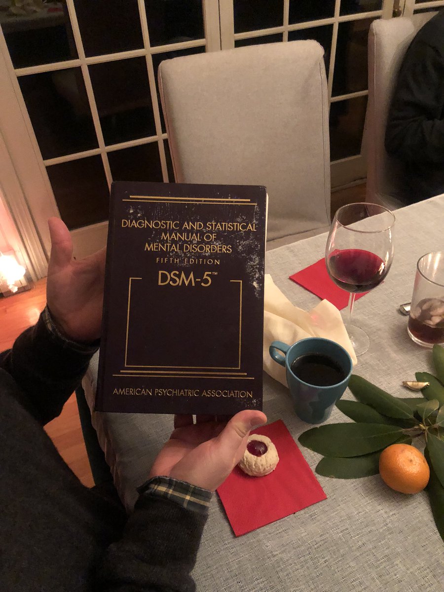 _henry________'s tweet photo. WHY IS EVERYONE PASSING AROUND THR DSM-5 AT CHRISTMAS DINNER LOL https://t.co/HLvrgoA7IT