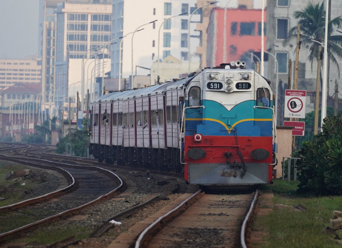 nazly's tweet photo. Remembering all the lives we lost during the Tsunami in 2004 🇱🇰

In memory of the train that got caught to the waves on that day, the Maradana - Matara express (No.8050) today was hauled by the Class M2 591 'Manitoba' locomotive known as the 'Tsunami Train'. 🙏 https://t.co/5HbHqoQ1lx