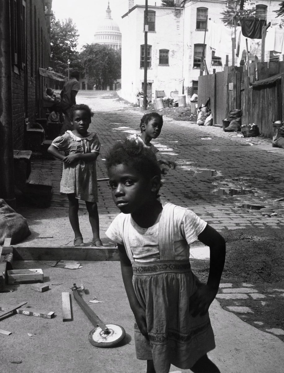 OLDDMVPICS's tweet photo. Washington DC (1948). In the Shadow of the Capitol, photographed by Marion Palfi. https://t.co/ItkVTTuKXw