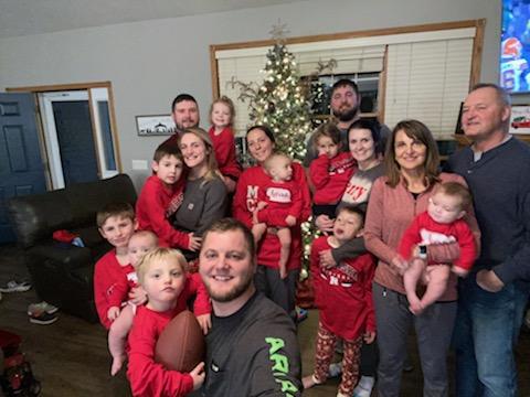 8 adults, 9 kids. Our first Christmas outnumbered, and family pictures are starting to get tougher. Merry Christmas from the Sibbel's