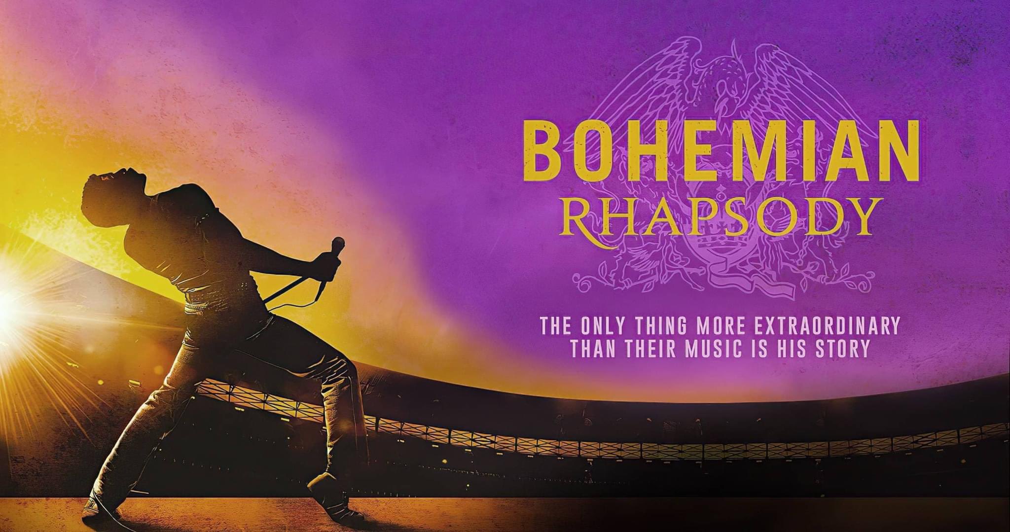 Promotional poster for the film Bohemian Rhapsody, featuring a silhouette of Freddie Mercury striking a pose with a microphone against a vibrant yellow and purple background.