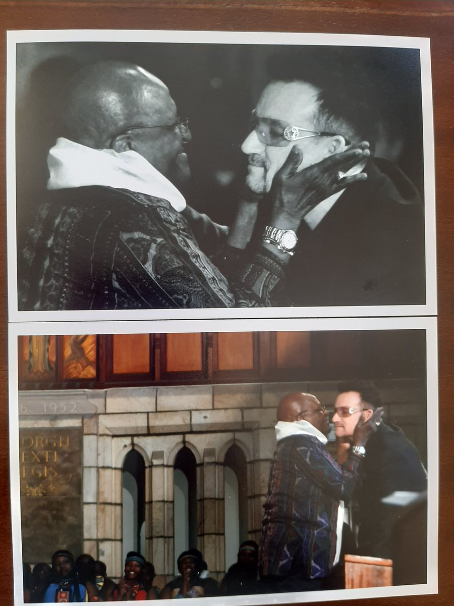 RediTlhabi's tweet photo. Someone check on Bono @U2 . #ArchbishopDesmondTutu LOVED him. They loved each other. Pics from The Arch's 79th birthday in Cape Town. He jumped on stage after Bono spoke &amp; said "You, iza lapha! Come here!" They embraced. Bono called Tutu a ROCKSTAR! Many of us unashamedly agree! https://t.co/VqlVlvv5wH