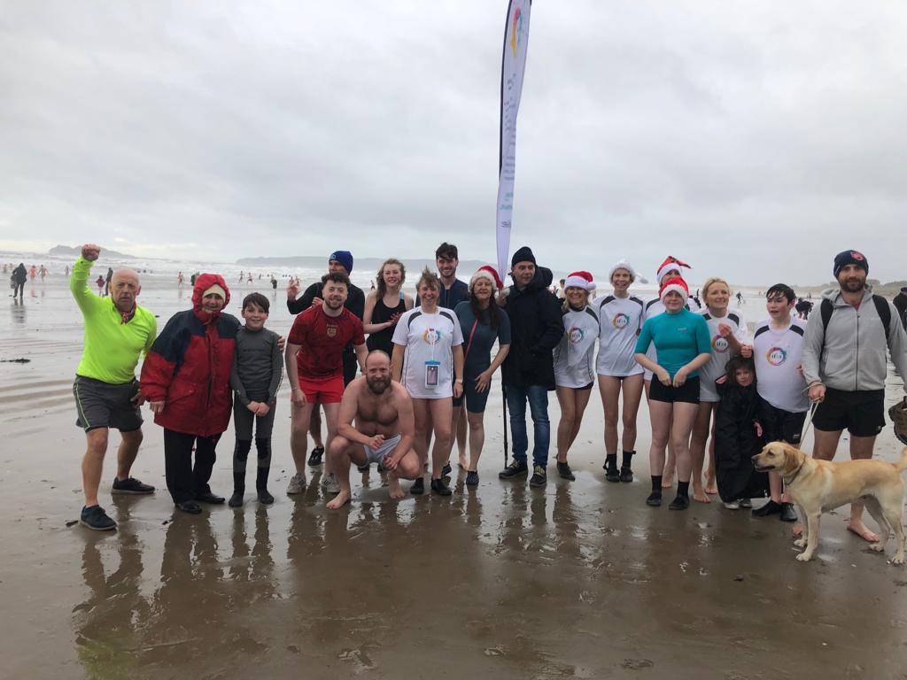 applersj's tweet photo. Thanks to everyone who braved the elements on Christmas morning for #fragilexmasswim #awakenyoursenses  A huge thanks for the gorgeous banner with info about #FragileX from Flags Ireland https://t.co/9JYsJz1ODh &amp; the lovely tshirts from @ClubFirst6 https://t.co/s2d4u3T3Xg