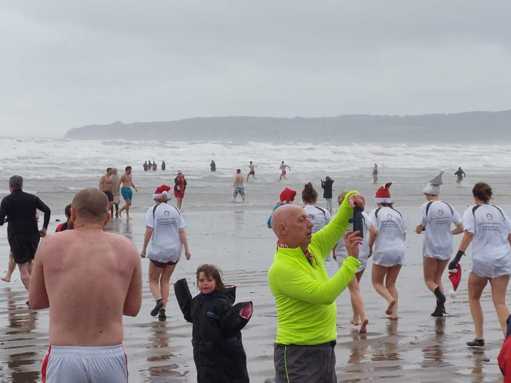 applersj's tweet photo. Thanks to everyone who braved the elements on Christmas morning for #fragilexmasswim #awakenyoursenses  A huge thanks for the gorgeous banner with info about #FragileX from Flags Ireland https://t.co/9JYsJz1ODh &amp; the lovely tshirts from @ClubFirst6 https://t.co/s2d4u3T3Xg