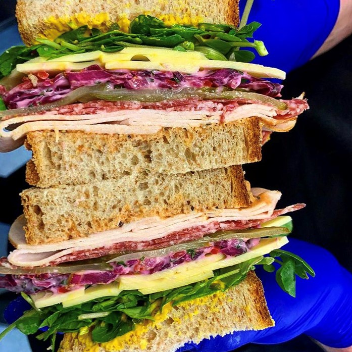 The big day is over and there's only one thing for it, a Boxing Day banger of a sandwich. Basically, pile in as much as you can between two slices of bread, turkey, salad, coleslaw, even roast potatoes if they can fit! Finish it off with yours truly, happy Boxing Day peeps!
