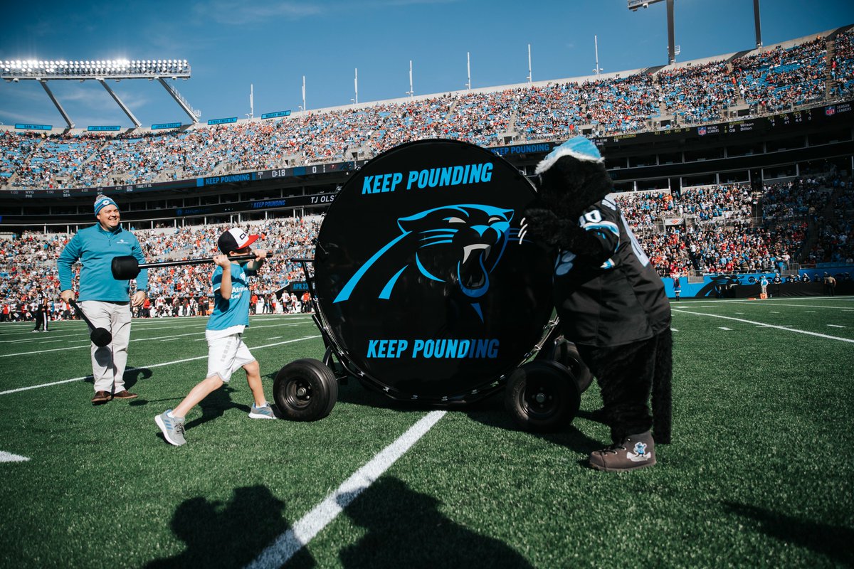 Panthers's tweet photo. TJ Olsen is doing great after his heart transplant this summer!

It’s an honor to have him &amp; his doctor (Dr. Wallis, Medical Director of Pediatric Heart Transplant) as our #KeepPounding Drummers! https://t.co/oEzOgxuunC