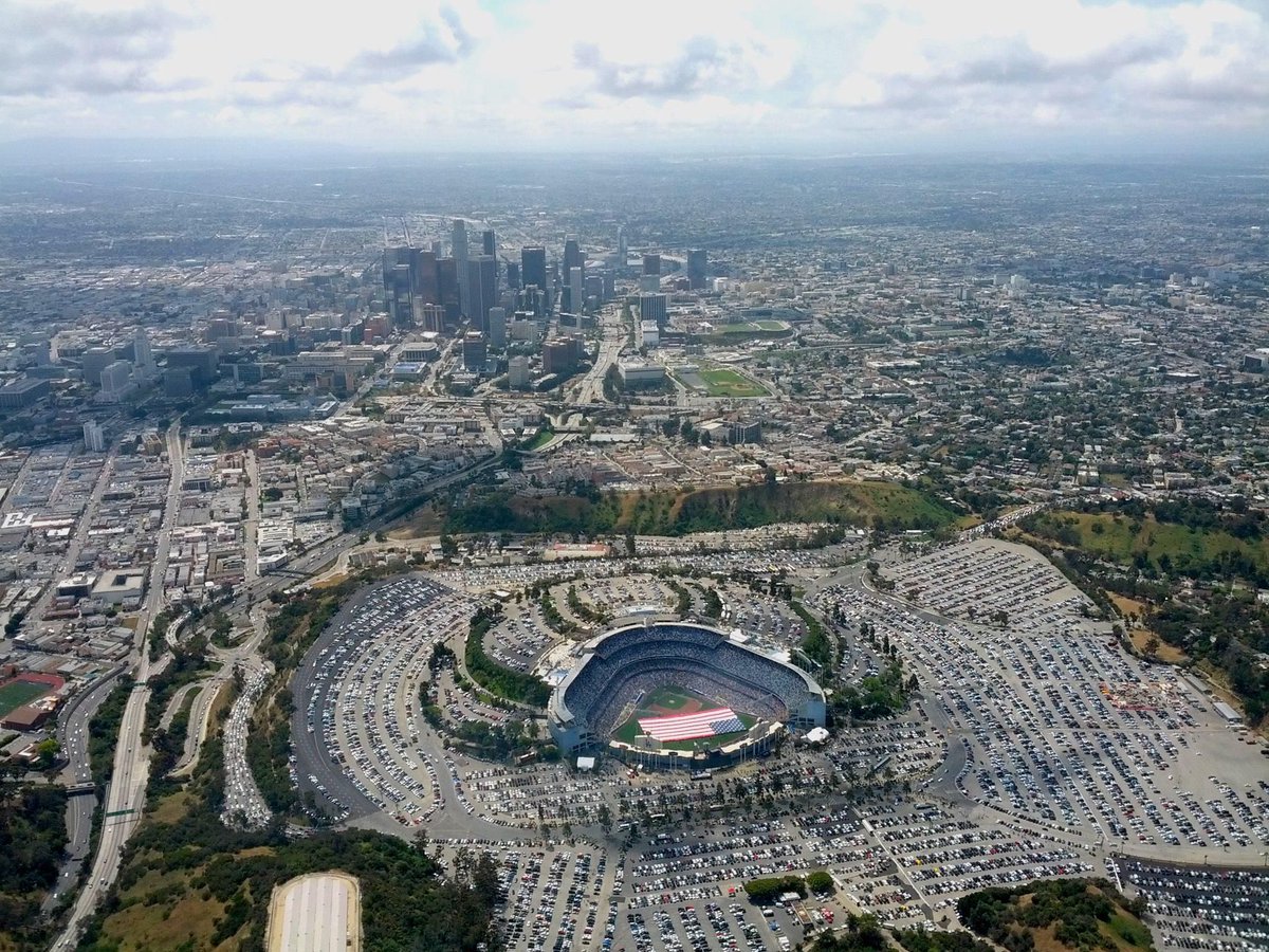 Stadiums are a great study of how little space people take up and how much space their cars need