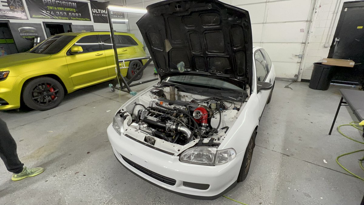 HussainAutos's tweet photo. I needed a new economical daily driver so I picked up this 1992 Honda Civic Hatchback. For some reason, it makes a bunch of noises and sounds like a jet. The owner said this was normal and he added the red thingy to help with gas mileage. Can anyone help? I think I got ripped off https://t.co/X5lj4Cdk3w