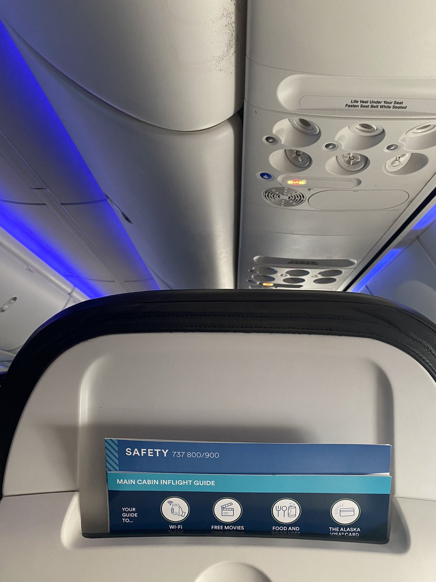 Xiiimiii's tweet photo. @AlaskaAir Glad you are keeping you planes clean during pandemic. Trash from previous flights on our seats, dust all over. https://t.co/TMqsjHmgHv