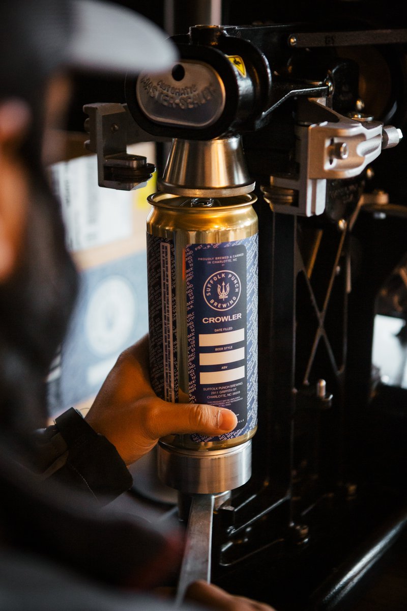 suffolkpunchclt's tweet photo. Guess who’s got crowlers? WE DO.

Now you can take all your favorite @suffolkpunchbrewing drafts home in a can! Come by our taproom this week and stock up for NYE! 🍻 🎉 https://t.co/YfixNuNZBT
