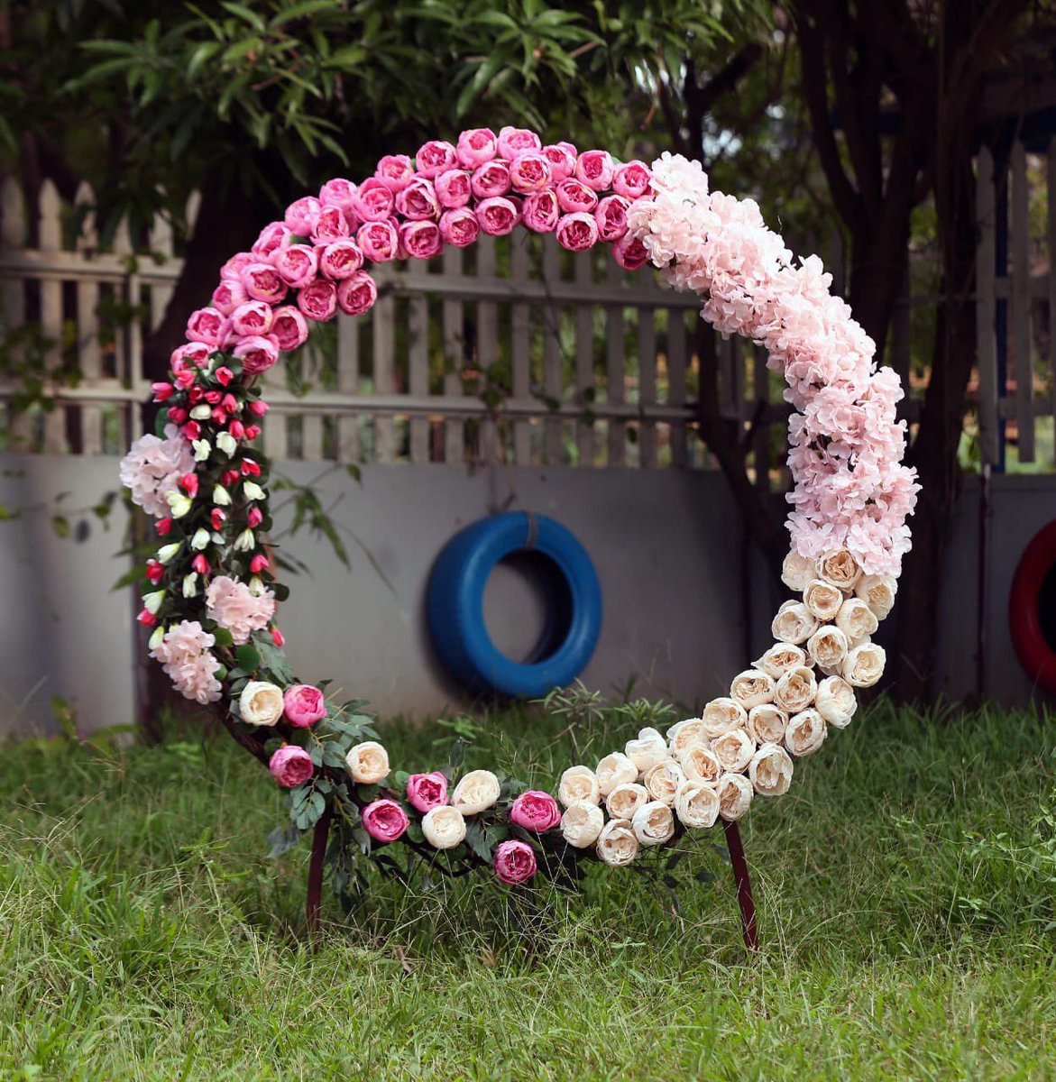 Make your wedding backdrop as unique as you with reflections of your wedding.Circular wedding arch 'A Ceremony Perfection'.#weddingarch #weddingflowers #wedding #weddingideas #weddinginspiration #flowerarch #weddingflowers #weddingdecor #floralarch #flowerarch #thekeylightstudios