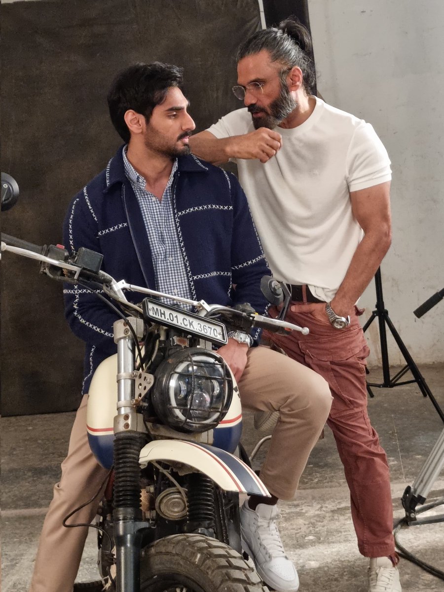 I won't be able to see any difference between both of them .. They both are looking younger brother .. But in relation the are father and son 

HBD AHAN SHETTY