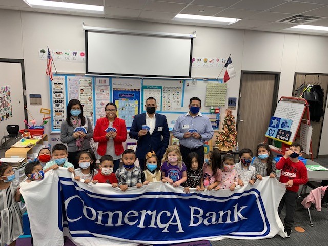 ComericaBank's tweet photo. The holiday season can be joyful but financially stressful for many families. Comericaβs Texas Hispanic Business Resource Group in Houston partnered with Landolt Elementary to distribute Walmart gift cards to students in need on behalf of Comerica Bank. #ComericaCares https://t.co/jfbbjlbAzc
