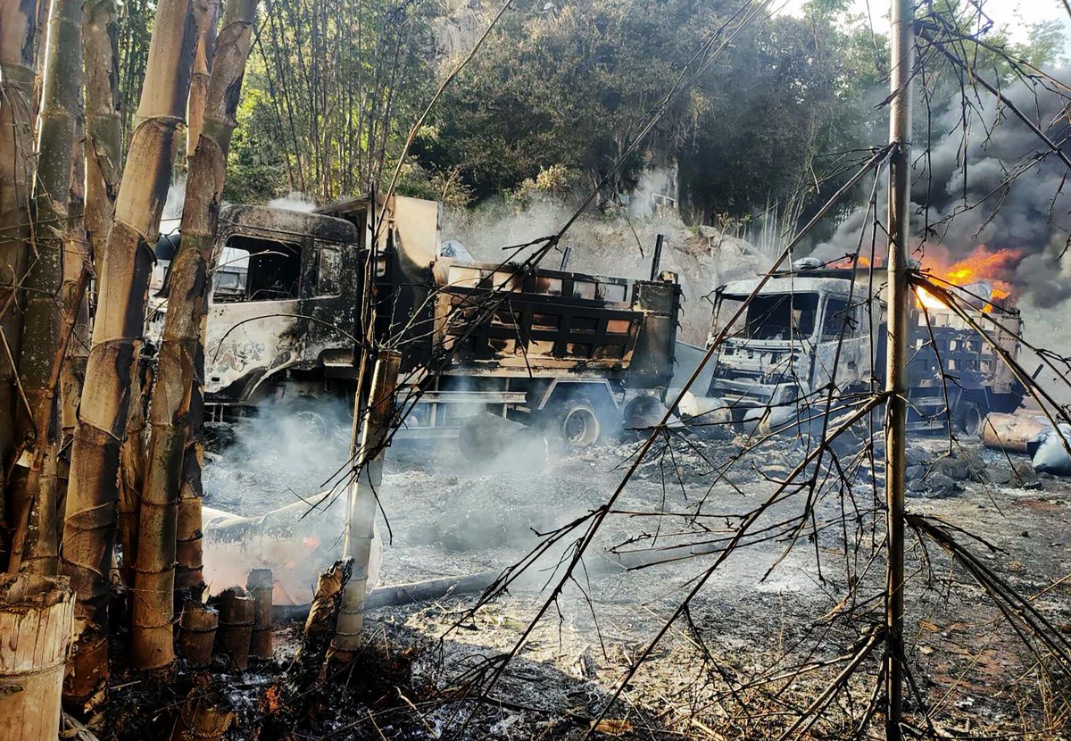KenRoth's tweet photo. Outrage mounts as photos emerge of a Myanmar massacre: "The photos showed the charred bodies of over 30 people in three burned-out vehicles who were reportedly shot by government troops as they were fleeing combat." https://t.co/AmzHyLby4G https://t.co/vGYSvcXVgj