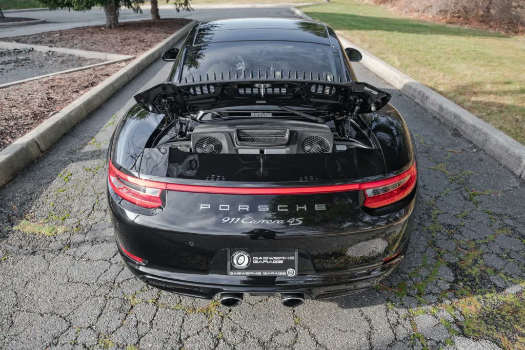 This 2019 #Porsche 911 Carrera 4S is finished in Black over a Luxor Beige leather interior. It only has 3,580 original miles and is equipped with a PASM Sport Suspension that lowered the vehicle 20mm. #PorscheMarketplace ▶️ porschemarketplace.net/vehicles/2019-…
