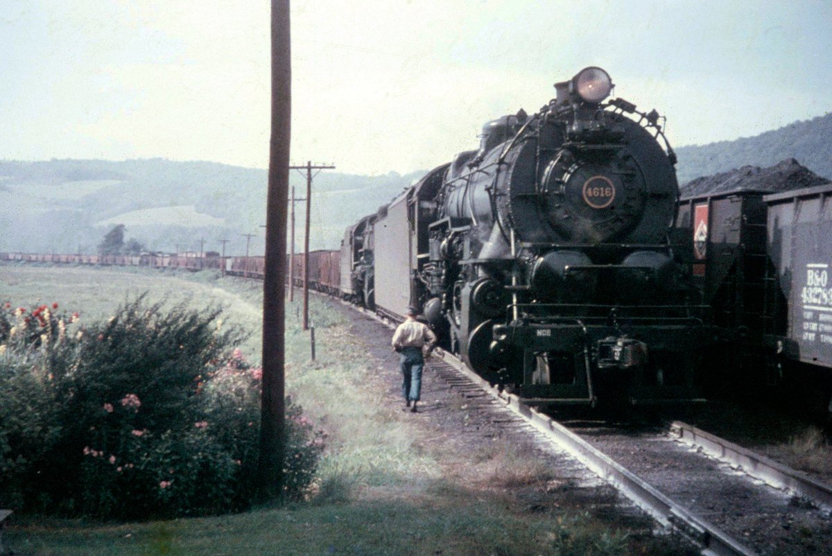 americanrails's tweet image. A pair of the Pennsylvania Railroad&apos;s burly 2-10-0s, #4616 and #4243, have a 9,000-ton iron ore train on the Shamokin Branch near rural Crowl, Pennsylvania during the 1950s.  Philip Hastings photo.  American-Rails.com collection.