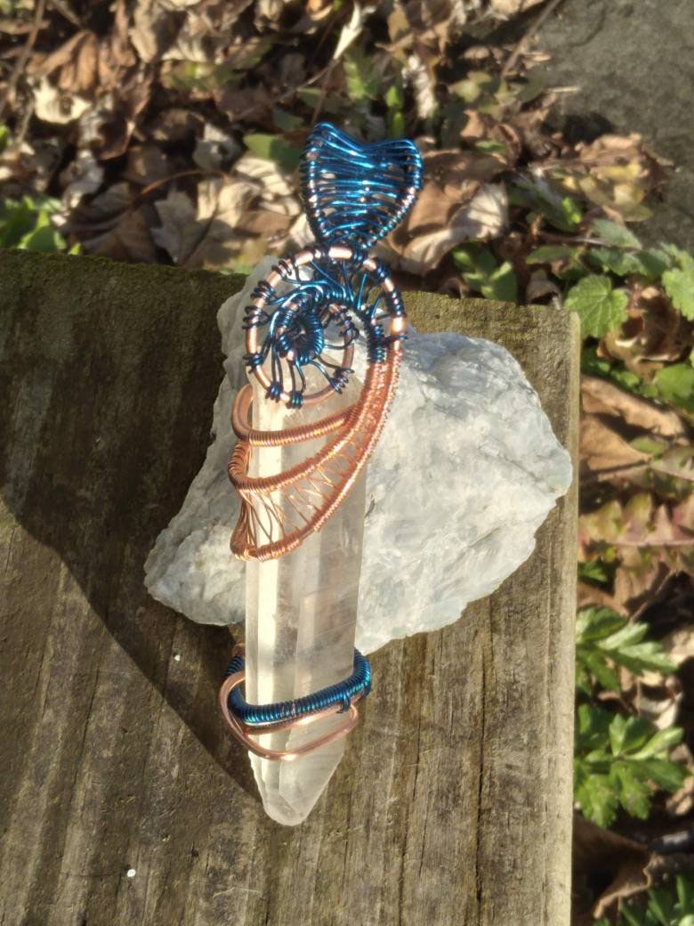 innovisjewelry's tweet photo. Excited to share the latest addition to my #etsy shop: Lemurian quartz crystal wire wrapped with copper and blue wire #blue #copper #quartz #unisexadults #lemurianquartz #necklace #handwrappedjewelry #innovatedvisions
https://t.co/cWz6uvgdPY https://t.co/oh3N9N6891