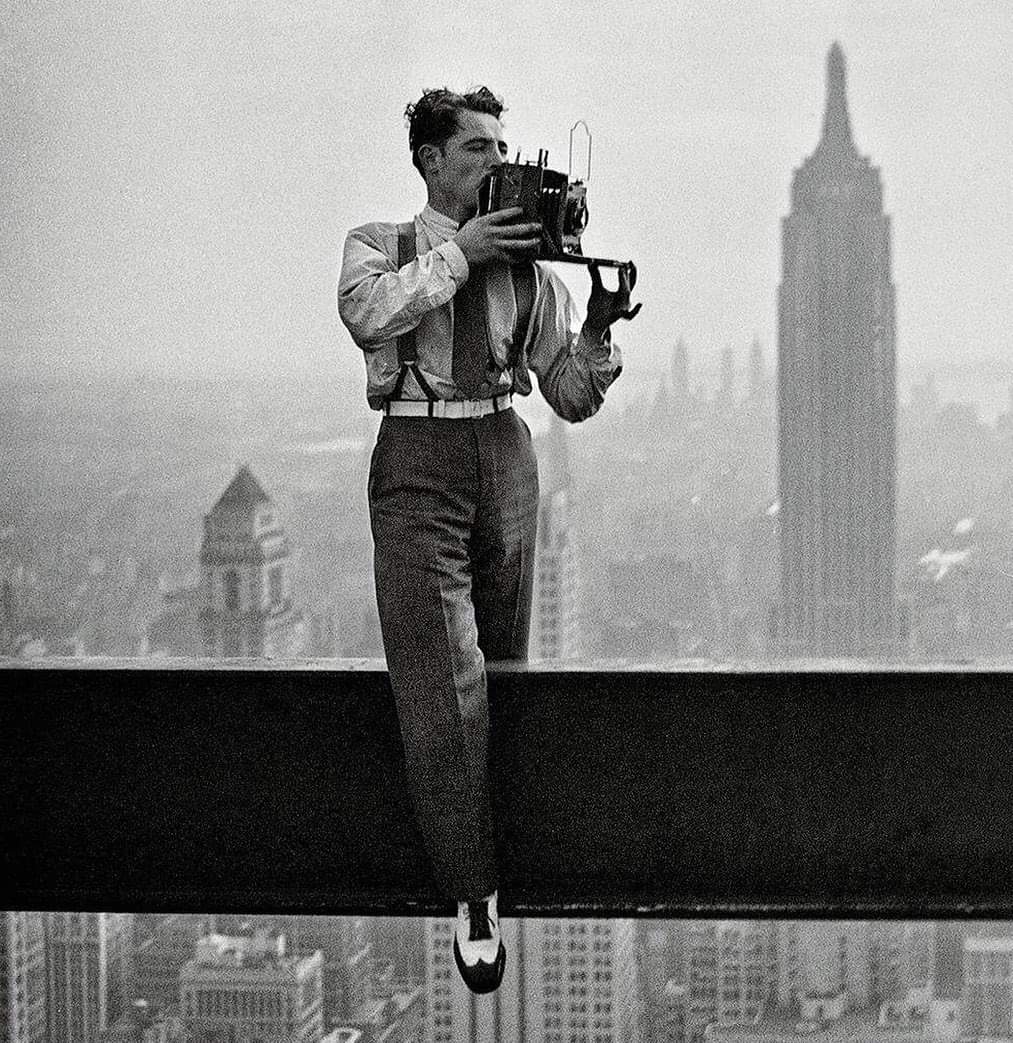darkwriter's tweet photo. We all know that photo of the construction workers having lunch on a unfinished New York skyscraper: here's the photographer #CharlesEbbets- 1932 https://t.co/docvKco3WP