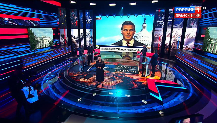 JuliaDavisNews's tweet photo. Suddenly, Madison Cawthorn's Fox News clips, praising Russia's military might and deriding America's capabilities, are being broadcast on #Russia's state TV. Perfect timing, in light of his St. Petersburg story being so widely discussed in the U.S. https://t.co/WmZONshjT3