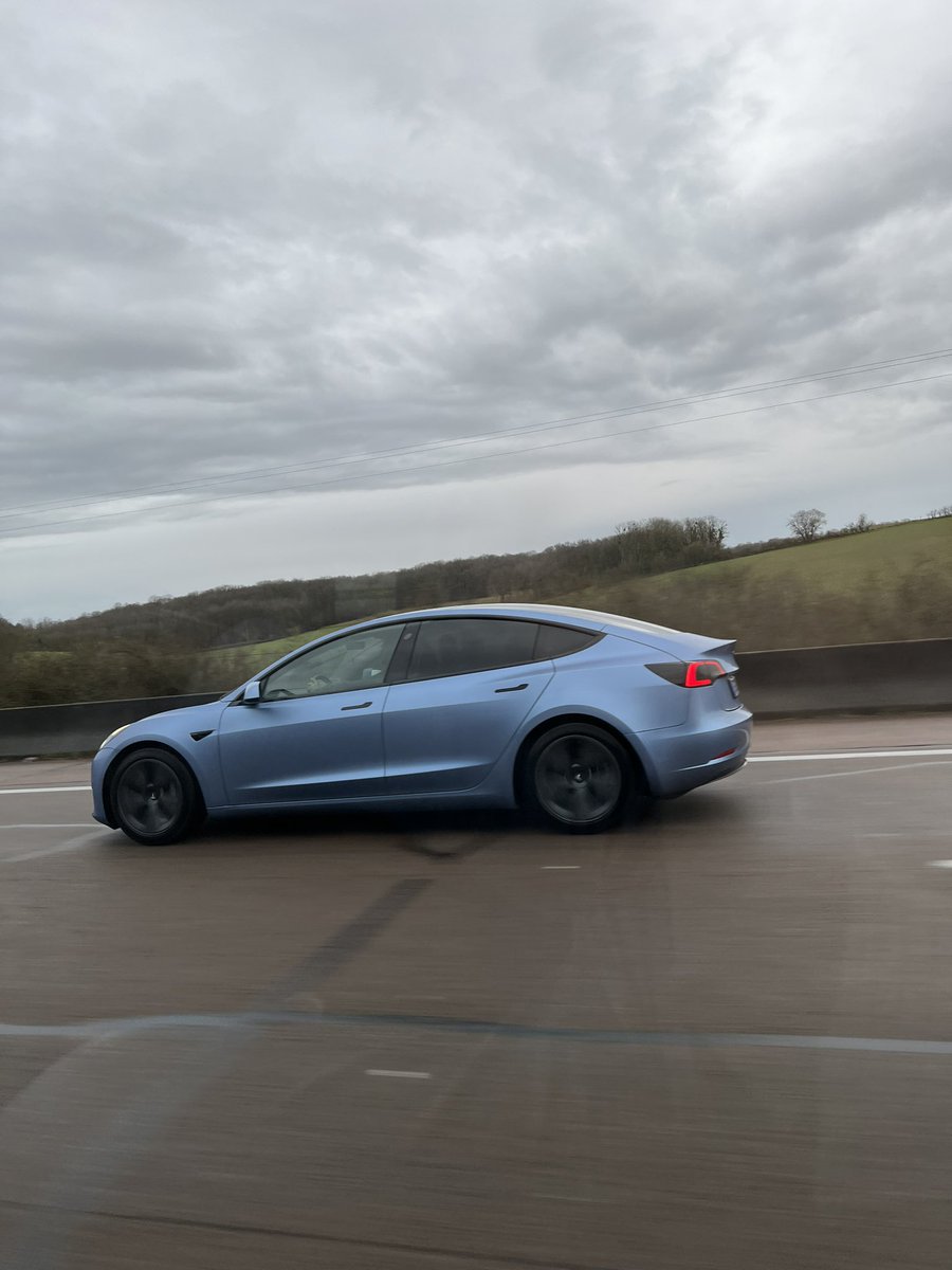 clembbt's tweet photo. One of the most beautiful #TM3 i’ve seen on the road so far 😍 #AlpineBlue  quite similar to my iPhone 13 Pro tbf https://t.co/XkfhBm8ahP
