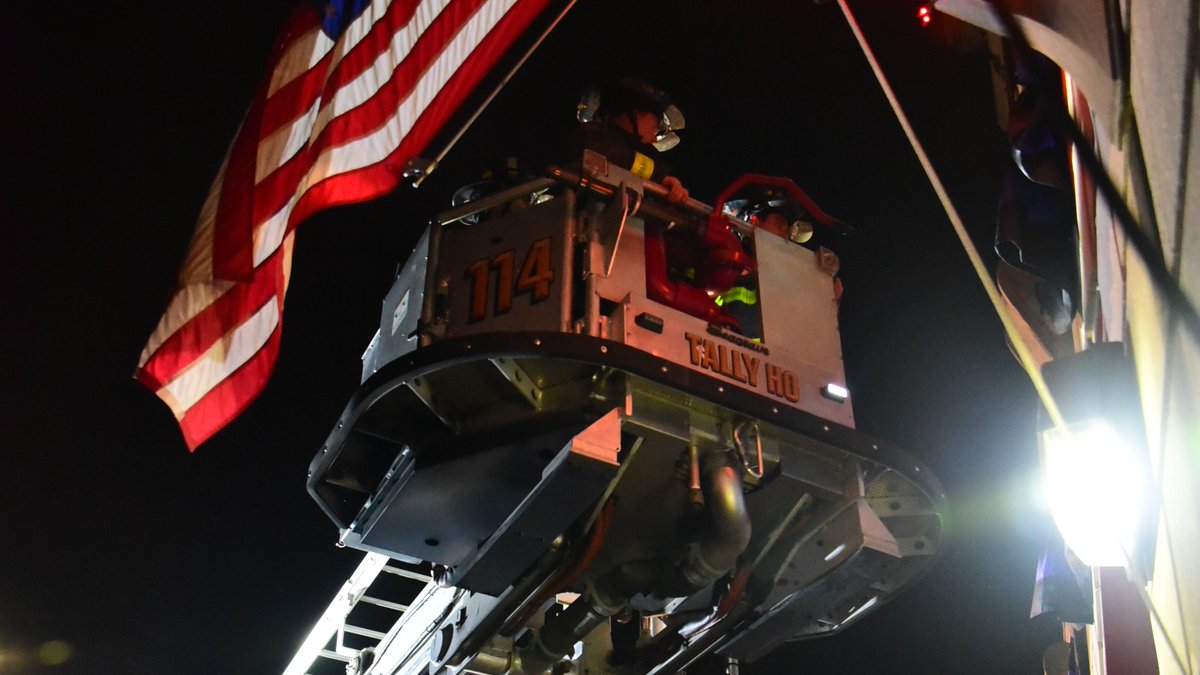 FDNY's tweet photo. FDNY Firefighters drape purple and black bunting on the exterior of FDNY #Engine282 and #Ladder148 where Lieutenant Joseph Maiello served as a Firefighter before being promoted in February of last year. Read more: https://t.co/ErKeGCzzSA https://t.co/JvUO9C9gCr