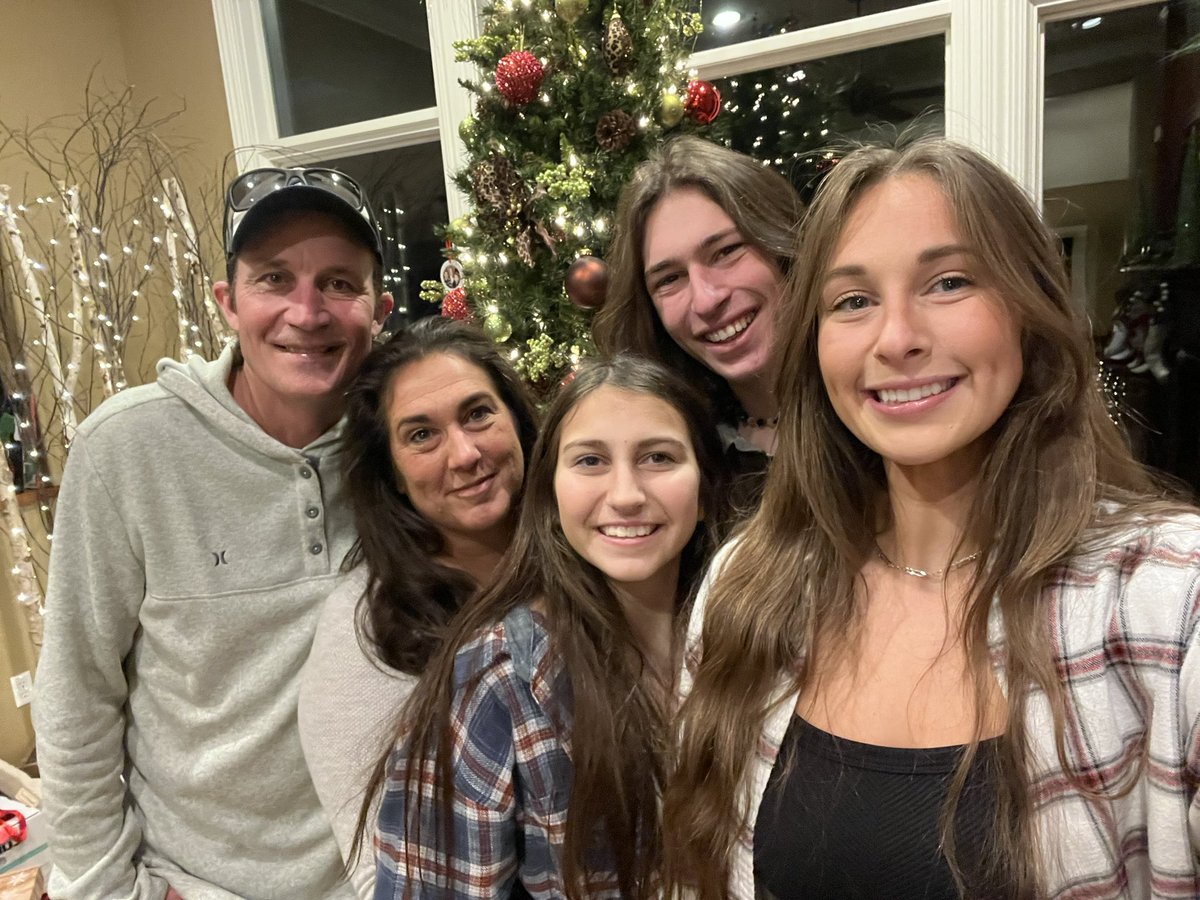 Annual family pic by the Christmas tree.🎄❤ Happy Holidays to all!