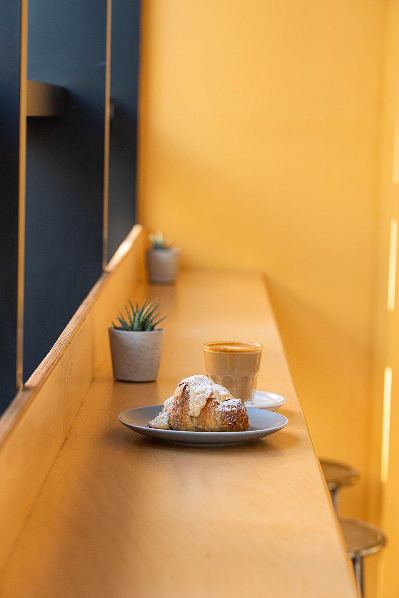 The perfect spot: Natural light, cozy, a good cup of coffee and a croissant to pair. Now the only thing's missing is you! Come on over to Reading with your book now. ☕