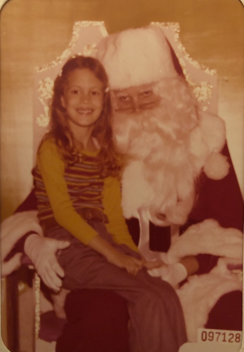 Got a bunch of old pics (in the mail) that my mother found, while prepping 4 her big move. This was one of them. Too funny. Creepy Santa. Barrettes all crooked ….&amp; look at that belt! Lol.
#NikkiNova #childhood #Christmas #Santa