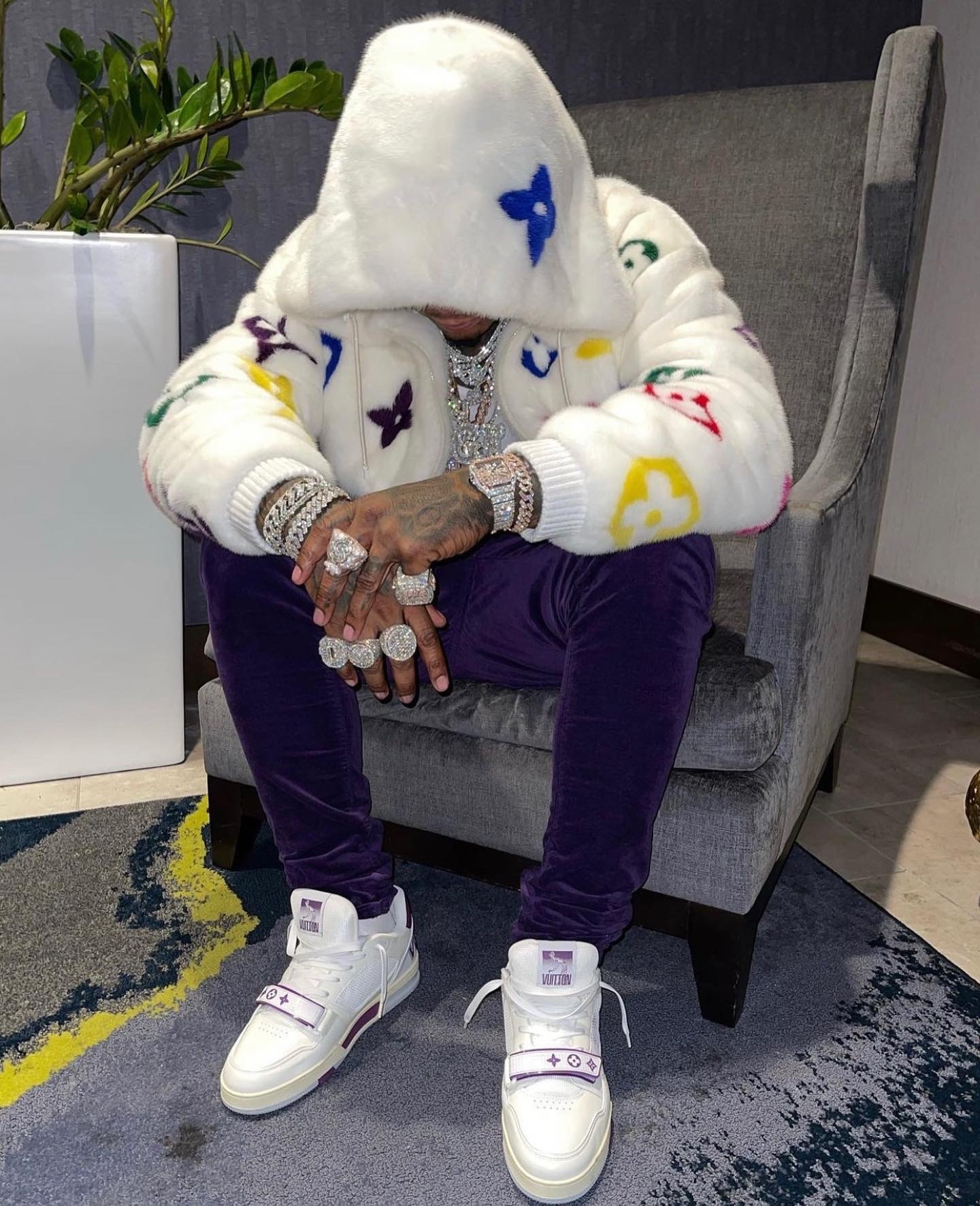 Moneybagg Yo Wearing a Louis Vuitton, Moncler, & Nike x Bodega Outfit