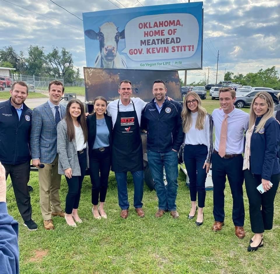 GovStitt's tweet image. My staff's 4th favorite picture of the year is from my most fun day as Governor!

PETA thought it was a good idea to put up a billboard calling me "Meathead Stitt" and saying "go vegan for life."

So, we decided to grill steaks, burgers and hotdogs right under the billboard!