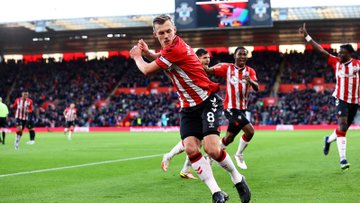 James Ward-Prowse begins the wind-up for his trademark golf swing celebration.