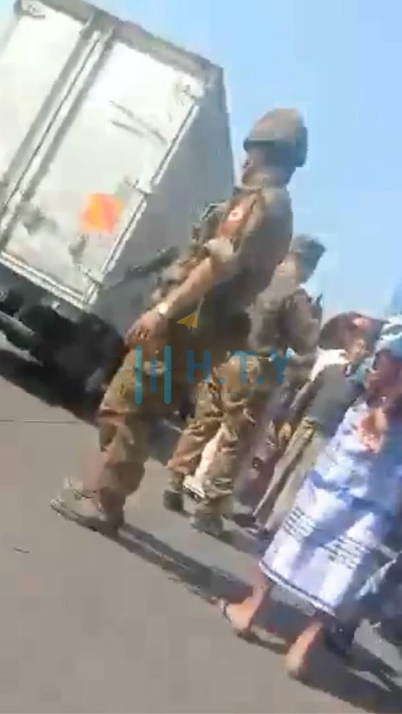 Military Terrorists and Informants Illegally Seizing civilians' motorcycles in Hlaingtharyar,Yangon on Dec 27 and Loading motorcycles into Military vehicles to collect bribes from civilians and sell the motorcycles. #Dec28Coup   #WhatsHappeningInMyanmar