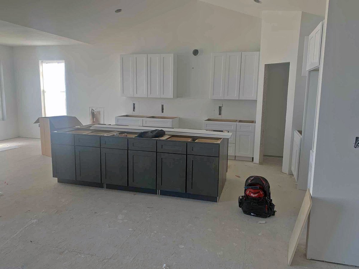 Things are moving along quickly on our custom home in Milliken, CO. The exterior of the house has been painted. Inside the drywall has been hung and textured. Cabinets and flooring are being installed, and the metal roof above the front porch is complete.

#contractor #customhome