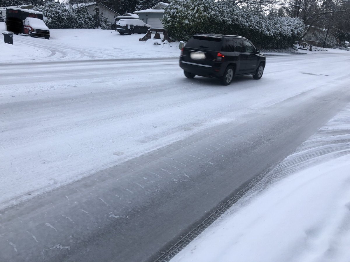 waEMD's tweet photo. Even if a road looks clear and plowed, it may not have been treated — and the result is a whole lot of compact snow and sheets of ice. If you don’t need to be out, stay home. If you do, take it slow. #wawx #wasnow https://t.co/xhcyinpHv6