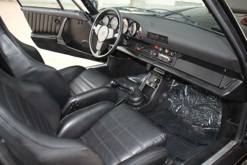 PorscheMarket's tweet photo. This 1977 #Porsche 911 Turbo Carrera Coupe is the first generation of the iconic 930 Turbo and is finished in Black over a Black interior with less than 20k miles. It's matching numbers and is an absolute blast to drive. #PorscheMarketplace

▶️ https://t.co/XTwQ3iTOxX https://t.co/bz2aLZnUtM