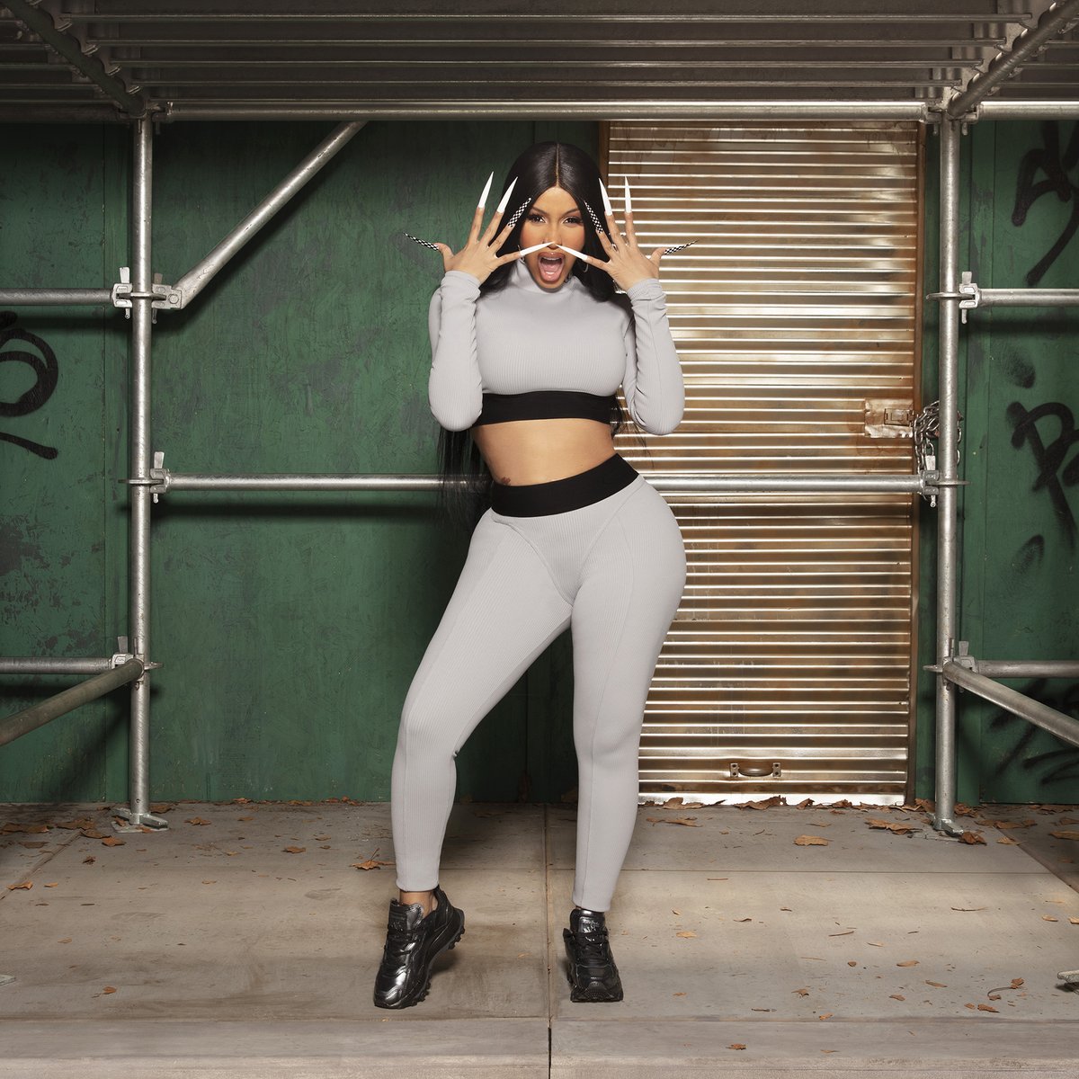 Reebok's tweet photo. Metallics as bold as Cardi. Classic Leather Cardi, available tomorrow. @iamcardib https://t.co/wXijvZTqJR