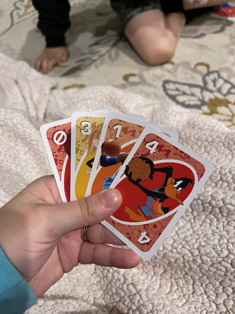 Jakennady's tweet photo. What in the color blind test is going on here?! 😵‍💫 @spacejammovie @realUNOgame Can I get a green or purple? 😂😂 https://t.co/Ooh0vQ35QI